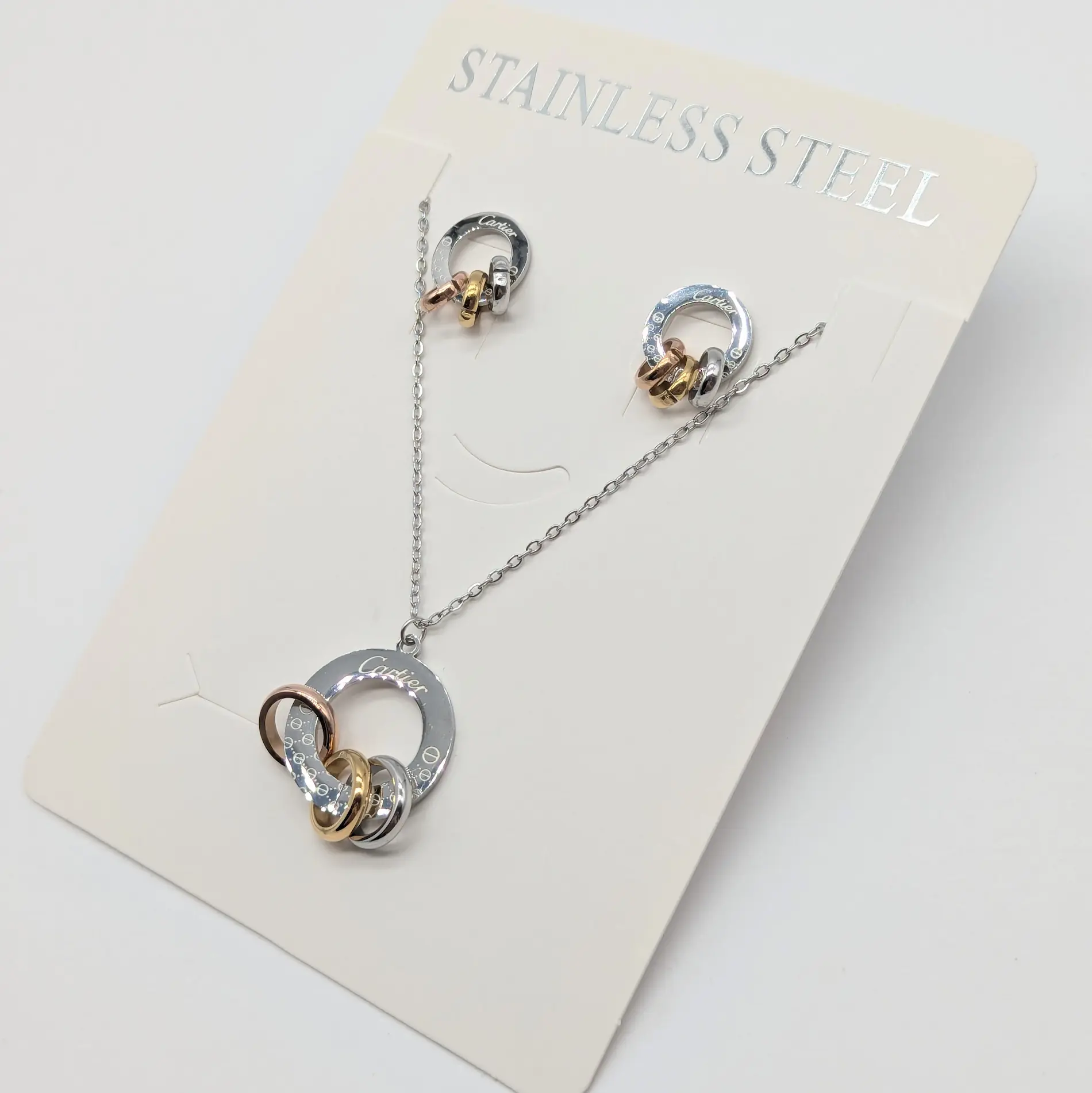 Набір Stainless Steel РС “Картьє” комбінований, довжина ланцюжка 41+5см Діаметр кулона 2.3 см; діам сережок 1.5 см