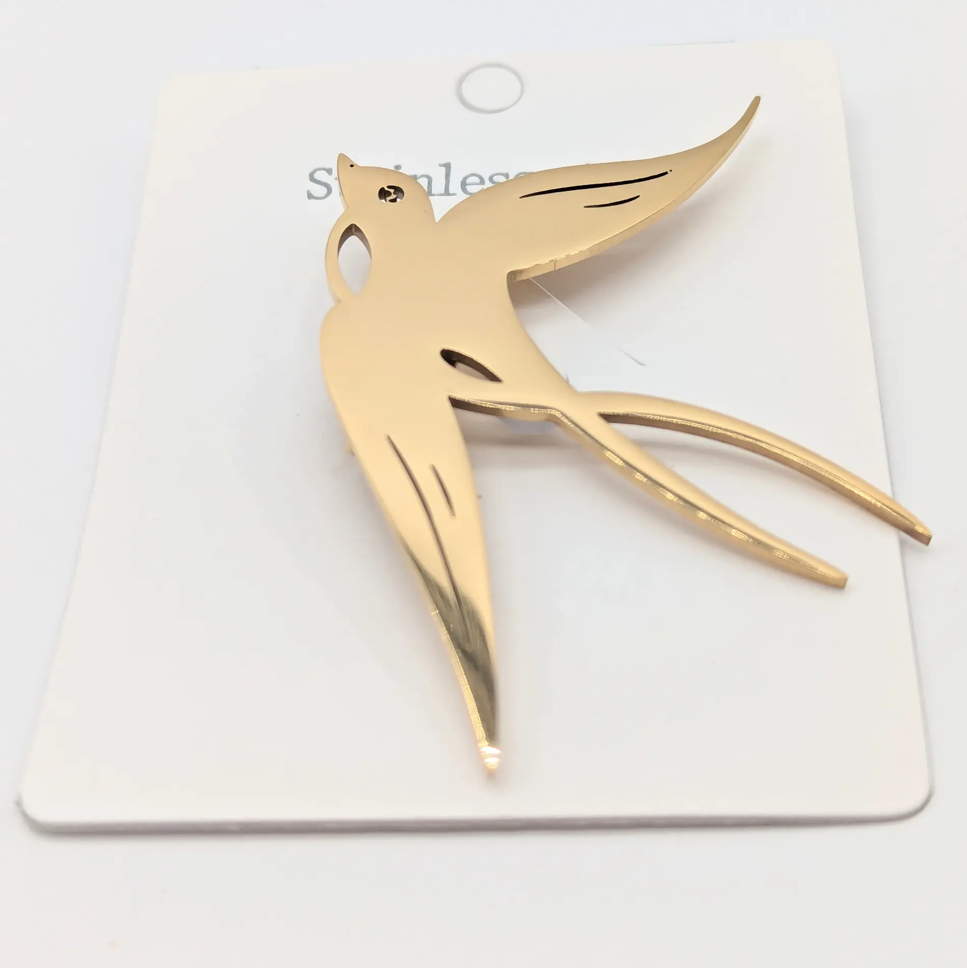 Брошка Stainless Steel “Ластівка” у золотистому покритті 14к, шпилька 2.5 см